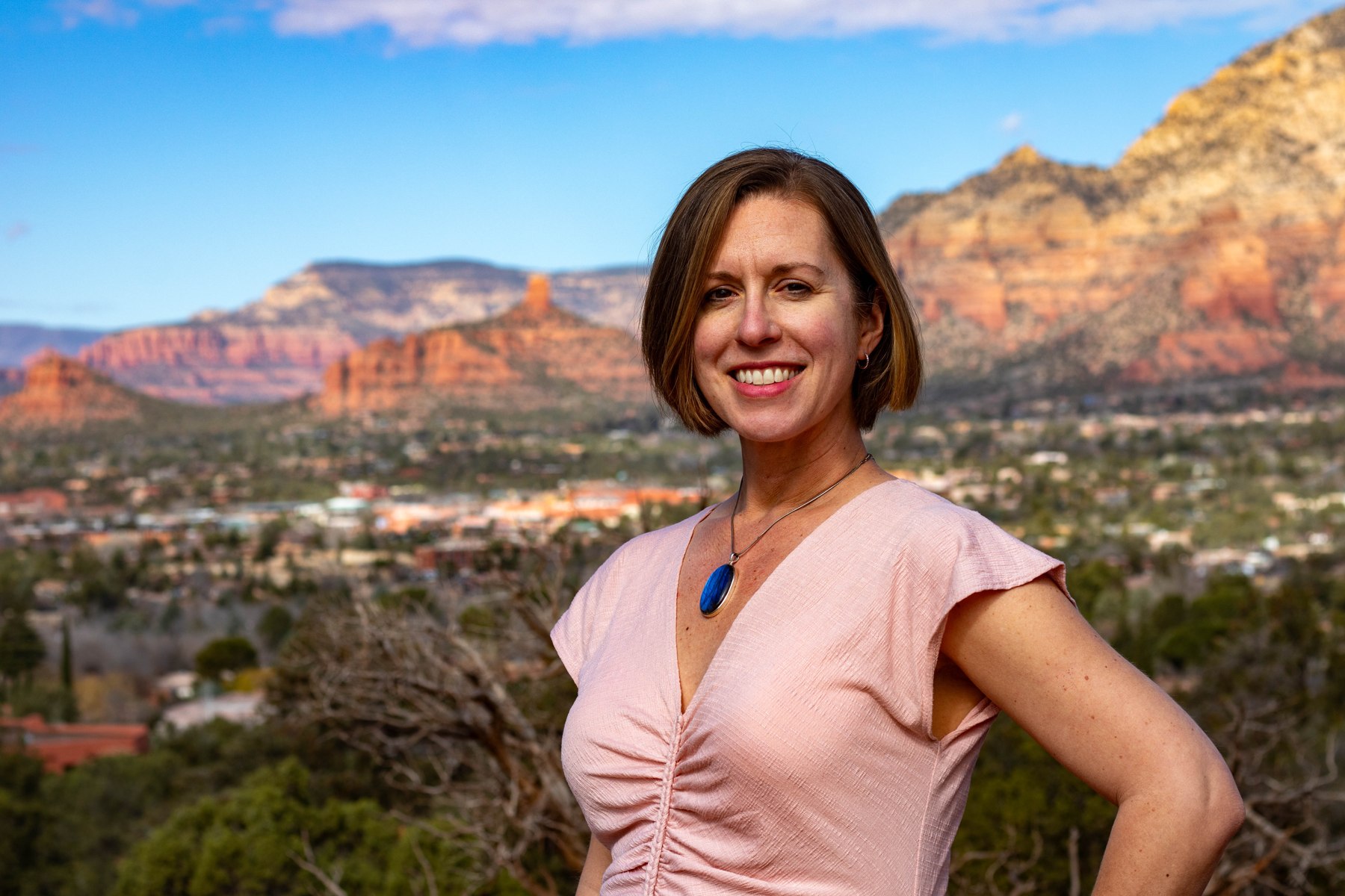 Marin Bogert smiling outdoors in Sedona